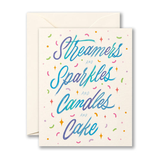 Card- streamers, sparkles, candles, cake